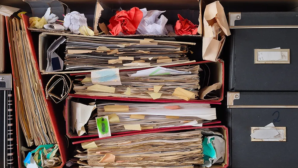 Stack of messy papers.