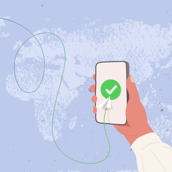 Illustration of one phone transferring money to another phone around the world