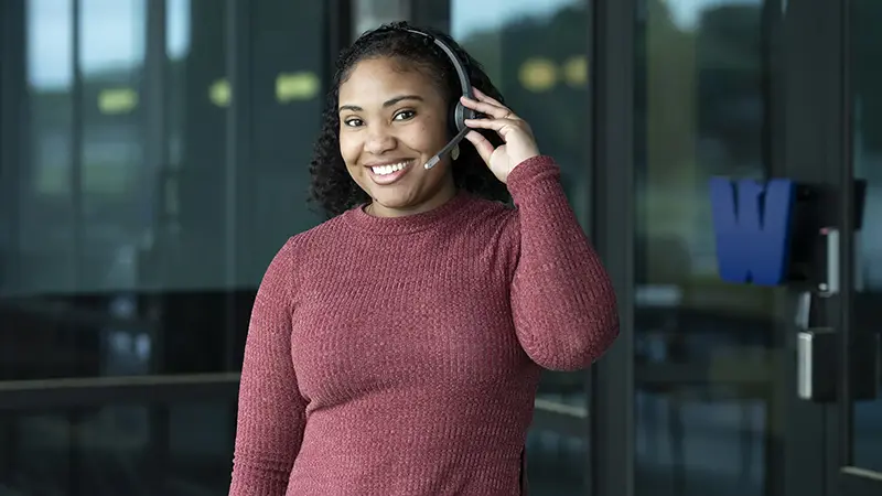 woman smiling in an interview