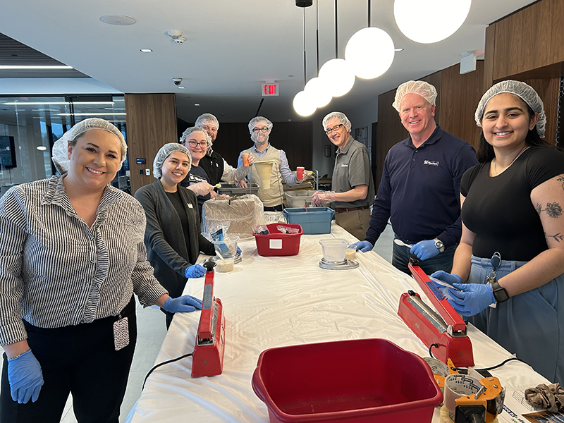 West Bankers volunteer to pack hundreds of meals for Meals from the Heartland.